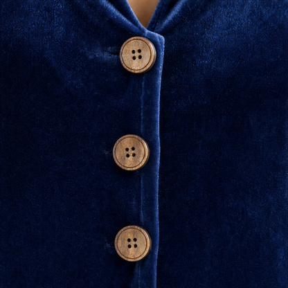 Long sleeve empire waist maxi dress, close-up of the texture