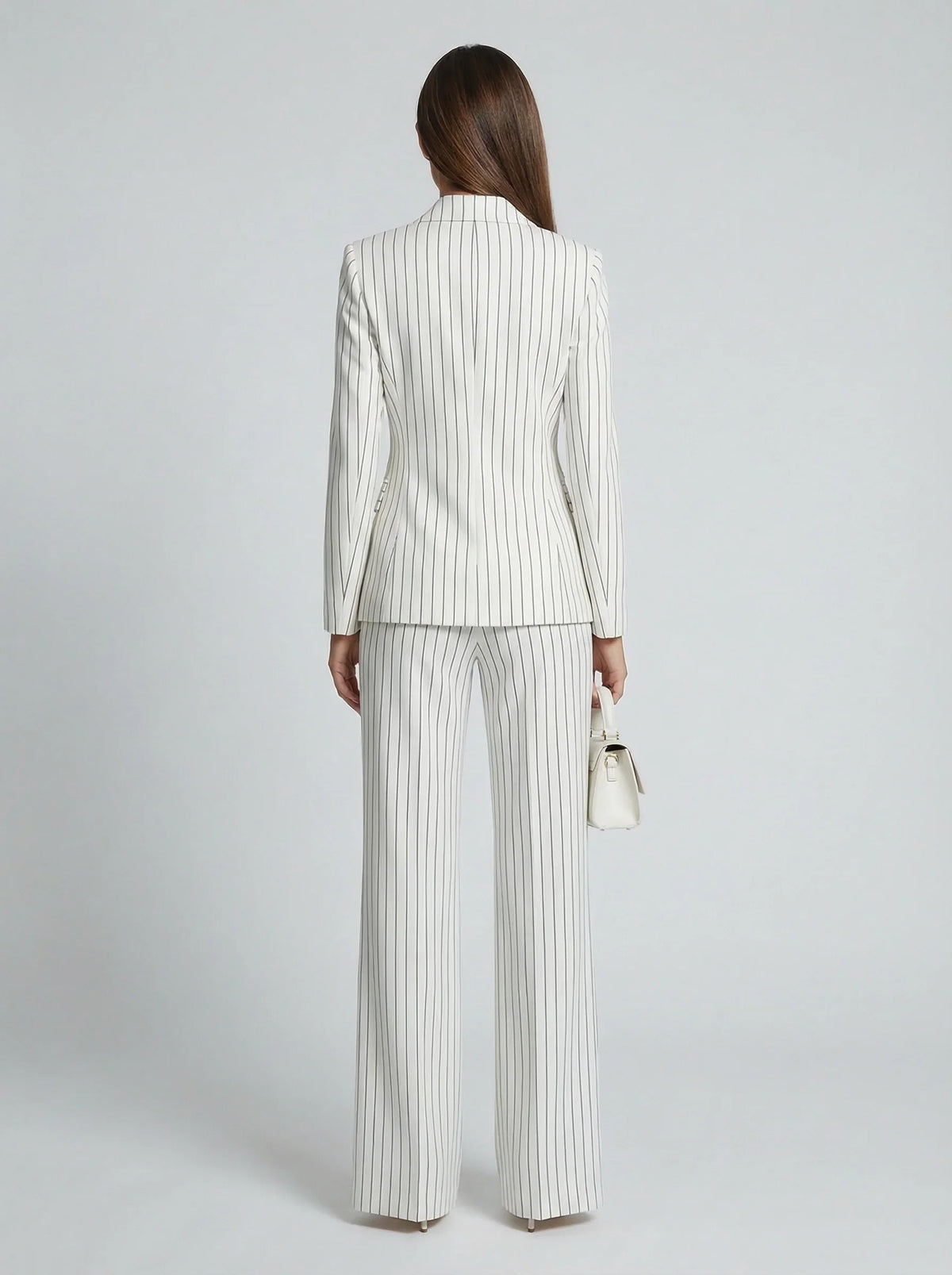 Pinstripe double-breasted pantsuit, close-up of the fabric
