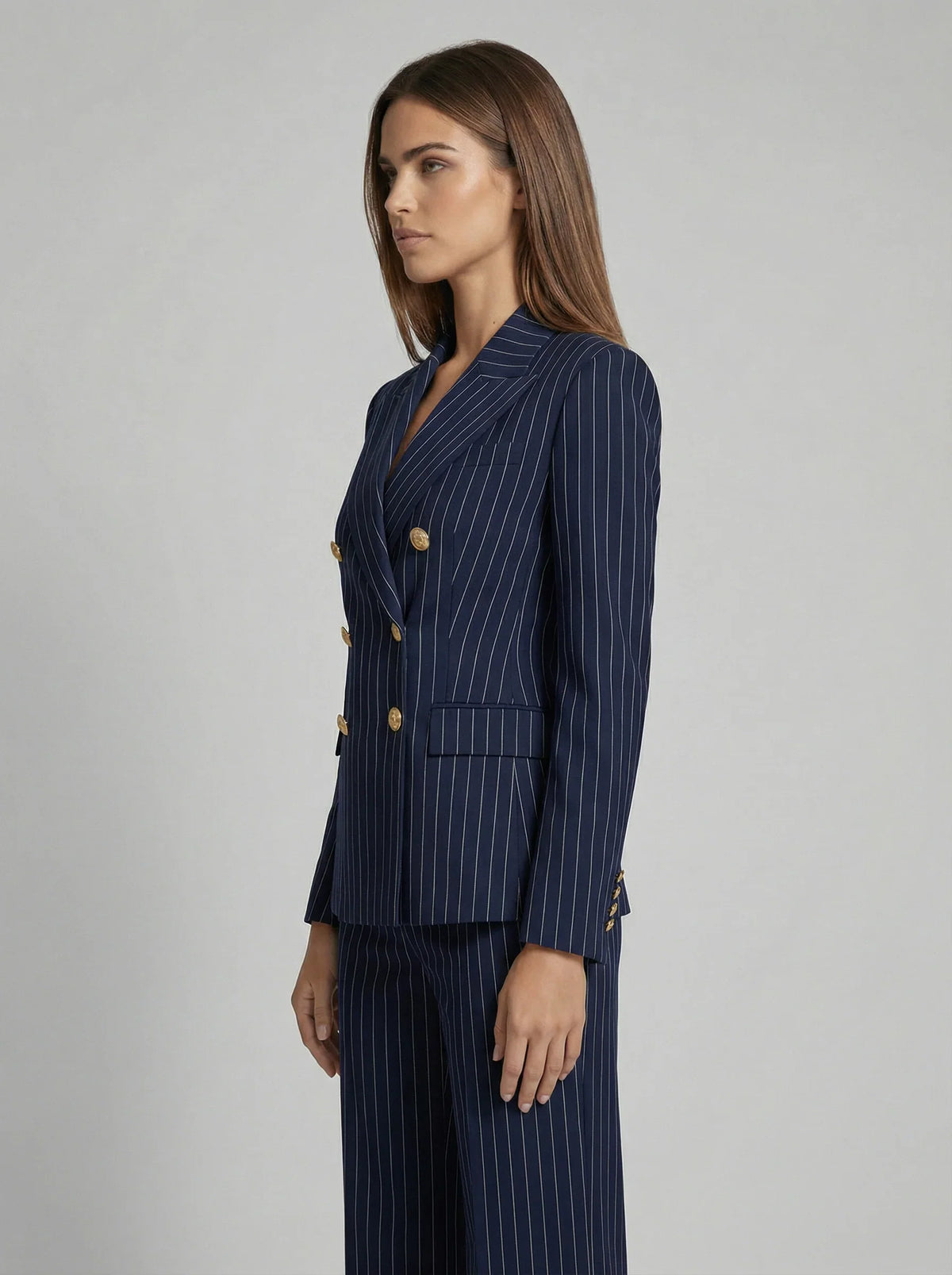 Pinstripe double-breasted pantsuit, close-up of the neckline