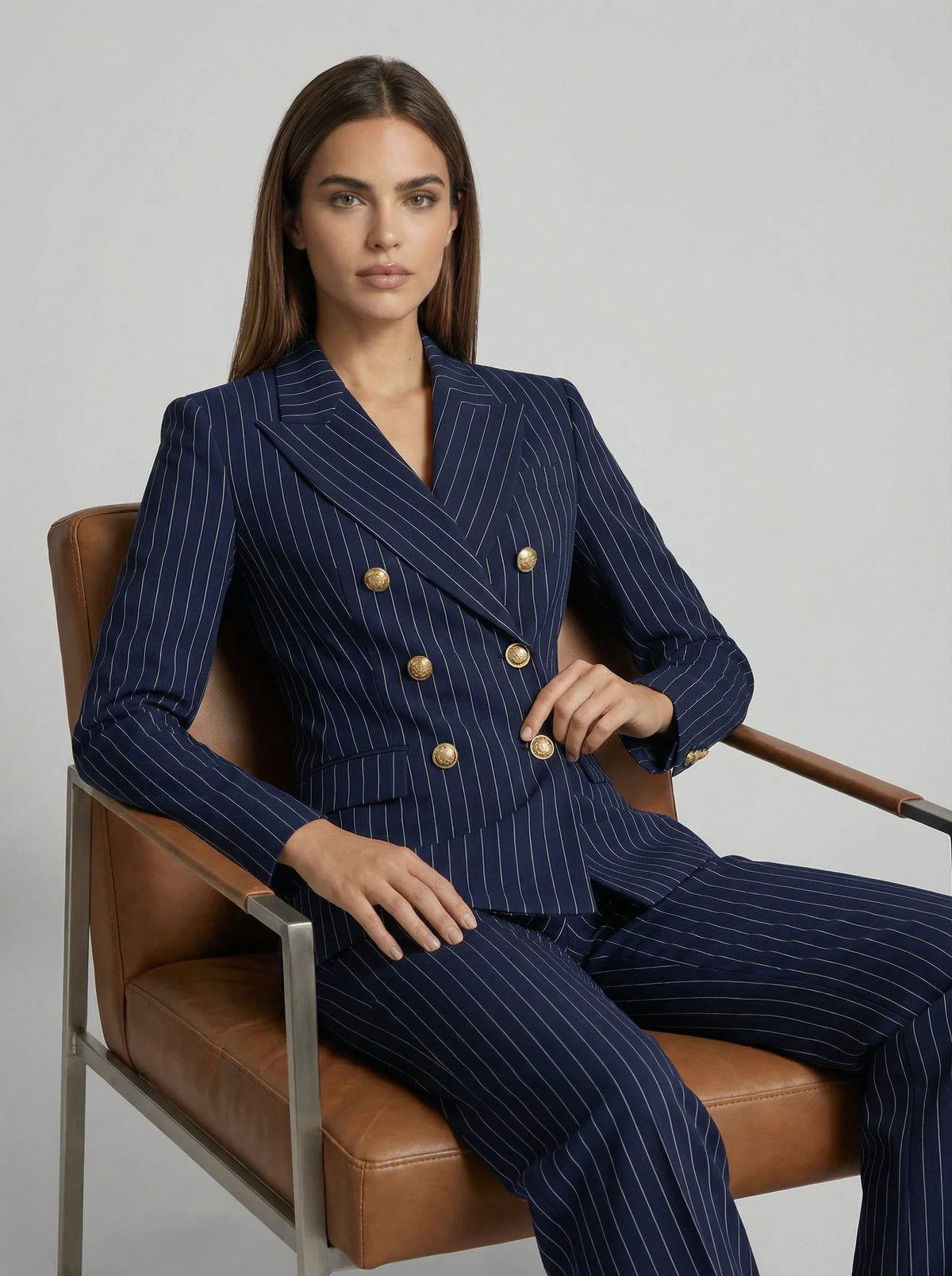 Pinstripe double-breasted pantsuit, angled front view
