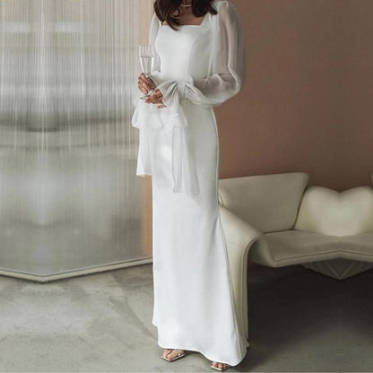 Sheer sleeve white maxi dress, side view